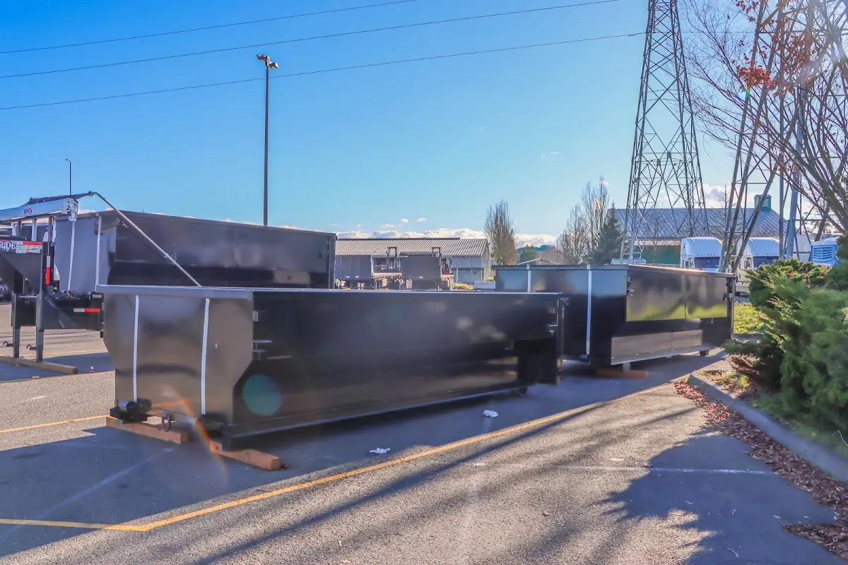 Roll-off dumpster ready for waste disposal at job site for Roofing Dumpster Rental in West Memphis